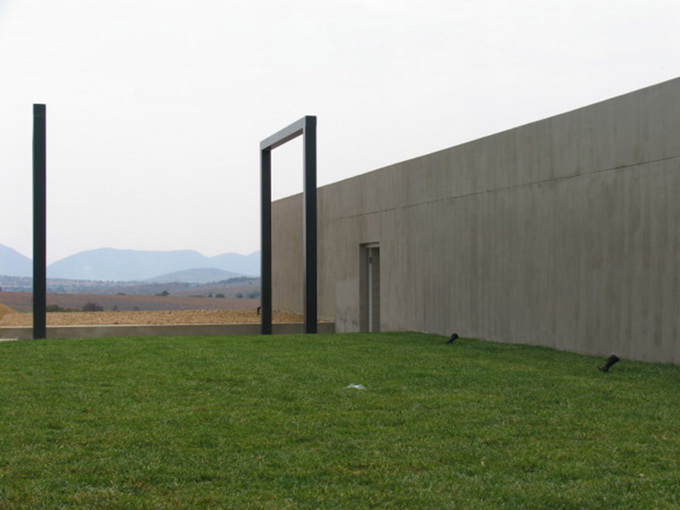 cement-house-on-green-field (4)