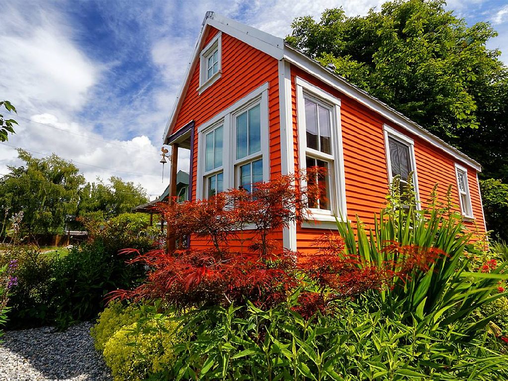 tiny-orange-wooden-cottage (1)