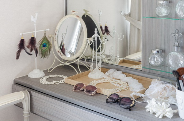 grey dressing table with accessories at home