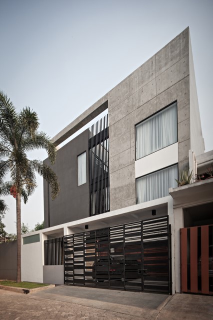 modern-house-box-shapes-with-cement-wood-and-glass-11